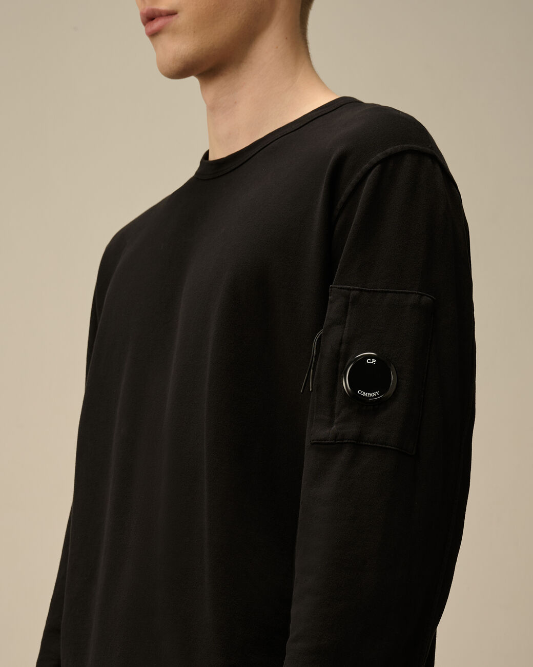 Foto di FELPA Uomo C.P. COMPANY MSS019A002246G 999 - Categoria: Maglieria | Brand: C.P. COMPANY