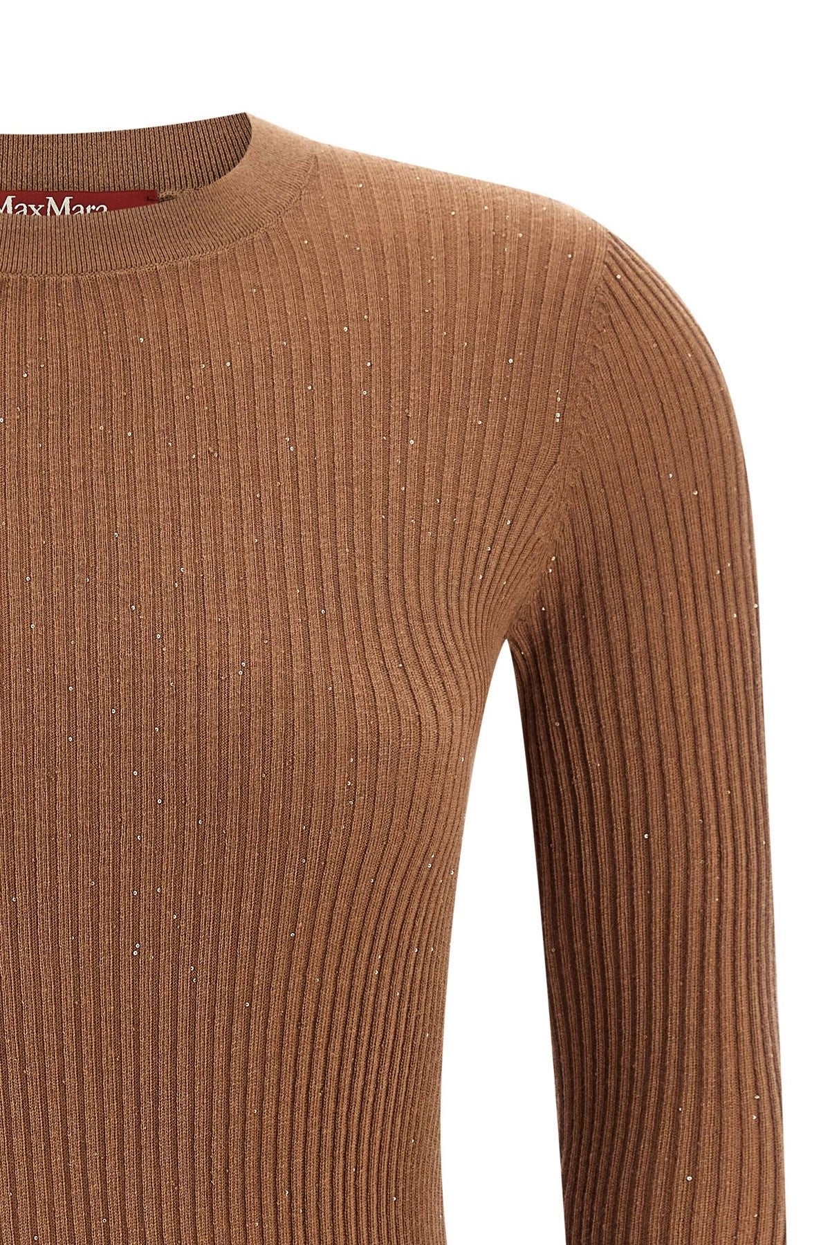 MAGLIA
Filato in maglia 55% Seta, 45% Lana Ovis aries aries
Bordi 43% Seta, 36% Lana Ovis aries aries, 19% Poliammide, 02% Elastan
- Decorazioni escluse DONNA MAXMARA STUDIO MARABU005